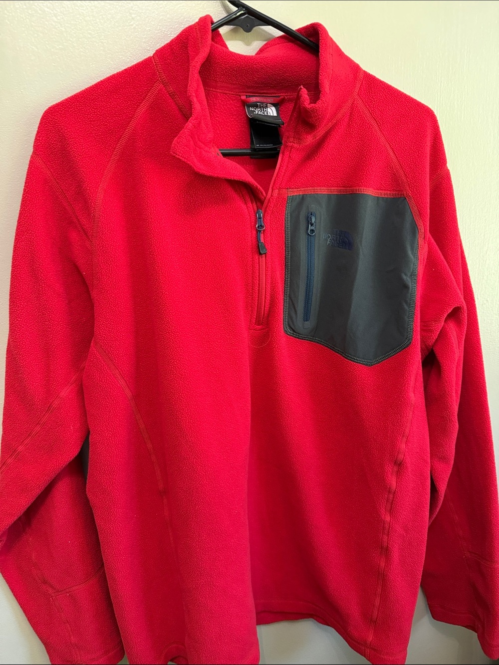 The North Face Men’s Red Lightweight Fleece Pullover with Black Chest Pocket